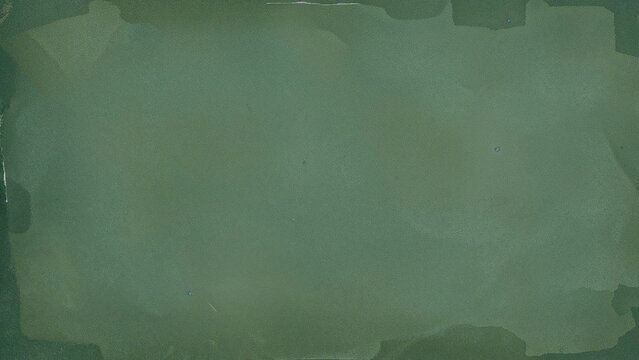 Aged green paper texture featuring worn and distressed surface