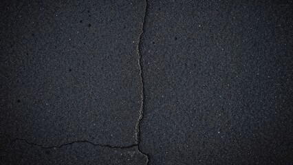 Obraz premium Detailed overhead shot of a rough and granular asphalt road