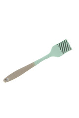 Flexible silicone cooking brush with green bristle on white background.