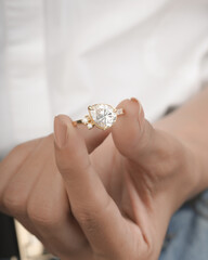 Enagegement Gold Diamond Ring with beautyful young model ledy  