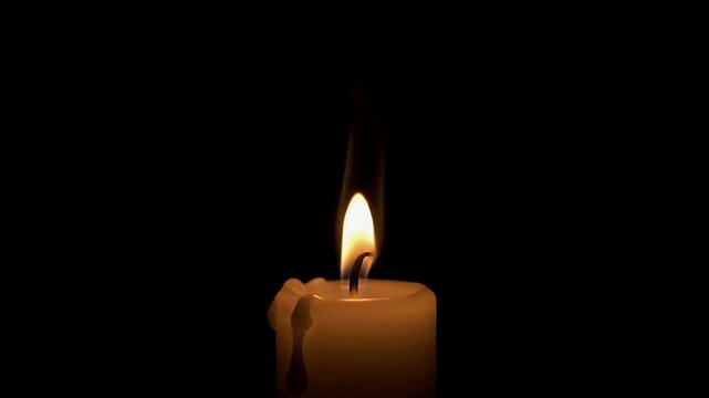 A lit candle with dripping wax is centered against a solid black background
