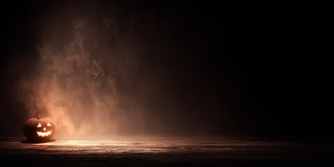 Glowing jack-o'-lantern on a wooden floor with fog. Minimal Halloween background with copy space. October 31.