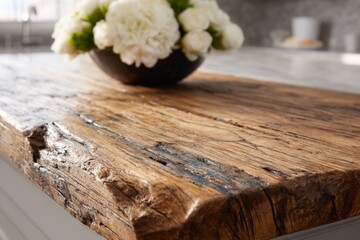 Fototapeta premium Rustic wooden countertop adorned with flowers in a modern kitchen setting
