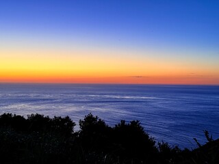 Golden sunset over Osezaki Lighthouse, Fukue Island, Goto Islands, Nagasaki, Japan – dramatic seascape and ocean cliffs with tranquil light on a remote headland.