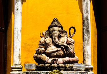 Sandstone Statue of Lord Ganesha on yellow background