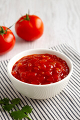 Organic Tomato and Cilantro Salsa in a Bowl, side view.