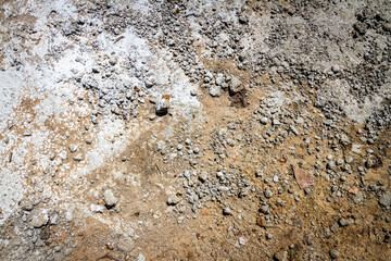 Concrete and cement stains on ground. Abstract messy construction background
