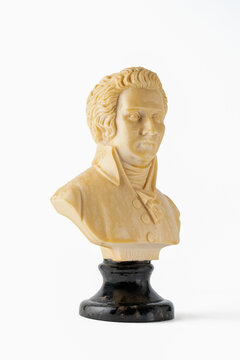 ornamental bust of Wolfgang Amadeus Mozart composer and musician isolated on a white background