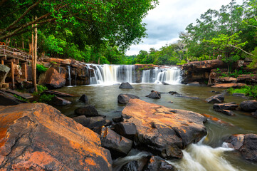 Beautiful waterfall, violent stream in the deep forest.Tropical waterfall Tadtone in climate forest, Chaiyaphum Province in Northeast thailand.
