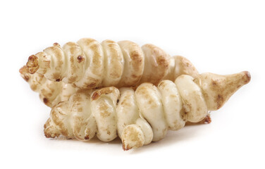 Gourami and grasshopper fresh pagoda vegetable meal with unique root vegetables showcased on a clean surface