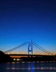 Fototapeta premium Scenic Span: Evening Crossing