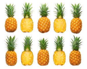 Arrangement of ten pineapples with some cut in half revealing the yellow flesh on black background