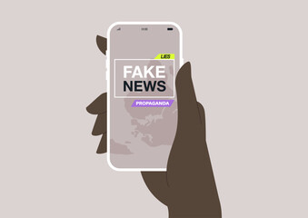 Fototapeta na wymiar A hand holds a sleek device displaying a striking visual representation of fake news, evoking thoughts on the influence of misinformation in the digital age and its implications in society