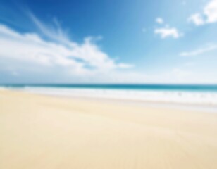 Blurred beach background with soft ocean waves and a golden sandy shore. A peaceful, tranquil scene perfect for summer, travel, and relaxation themes