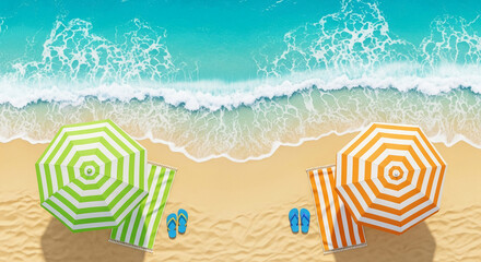 Aerial view of beach scene: two striped beach umbrellas, towels, flip-flops on sandy beach next to ocean waves, showcasing summer vacation concept