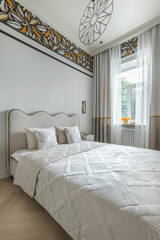 Bright Cozy Bedroom with Modern Bed and Window
