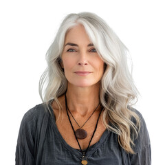 Portrait of a mature woman with long, wavy, silver hair wearing a simple gray top and necklaces. background removed