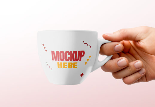 Cup Held by Hand Mockup