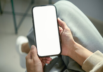 Hand holding smartphone mockup of blank screen. Take your screen to put on advertising graphic display montage.networking service.