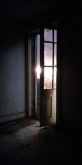 Fototapeta premium Abandoned room with a glimpse of light