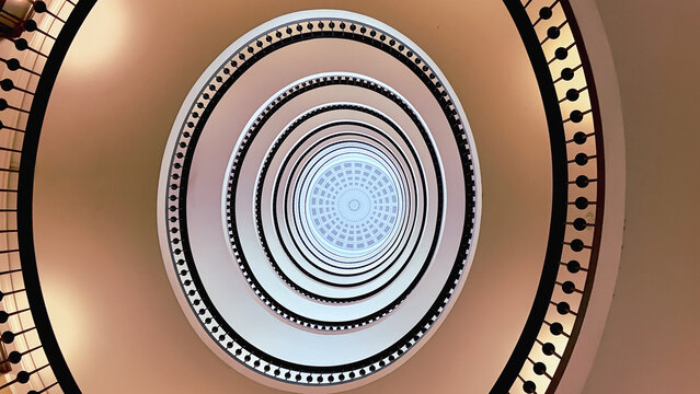 Abstract view from above of the spiral staircase in the tower - Powered by Adobe