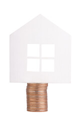 Model house on a stack of coins. Real estate investment, home savings, and mortgage finance concept. Isolated on white background with clipping path.