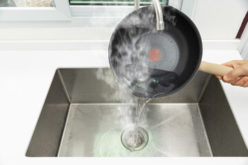 Avoid pouring hot water directly into a sink drain, especially if the pipes are made of PVC or if there are existing clogs, as it can cause damage to the plumbing system.