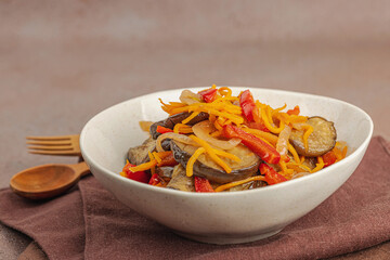 Vibrant salad in a trendy bowl. Fermented eggplant, bell pepper, carrot and onion. Healthy gut food