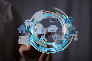 Person interacts with digital icons, representing global network, technology, and data connection.