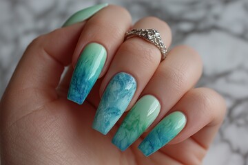 Gradient Blue-Green Coffin Nails with Subtle Sparkle 