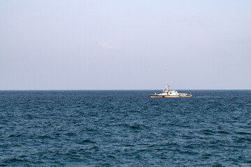 idyllic seascape with the police patrol boat