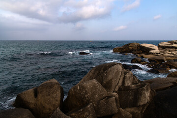 idyllic seascape with the rocky beach