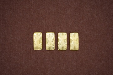Gold bars, gold color, containing 96.5 percent gold.