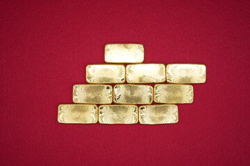 Gold bars, gold color, containing 96.5 percent gold.
