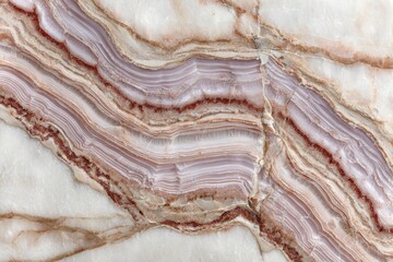 Detailed close-up of a marble slab with flowing, variegated veins