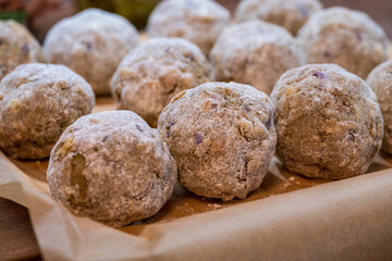 Self made bread dumplings in close up view which are as well called in Bavaria as Semmelknödel