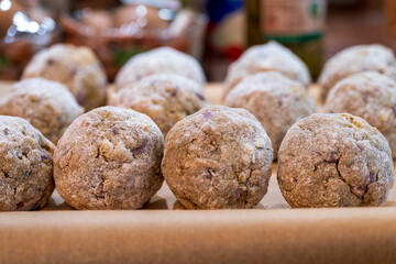 Self made bread dumplings in close up view which are as well called in Bavaria as Semmelknödel