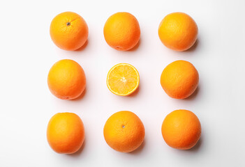 Fresh ripe oranges on white background, flat lay
