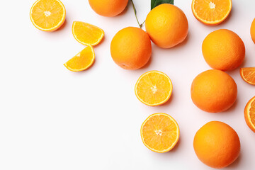 Fresh ripe oranges on white background, flat lay. Space for text