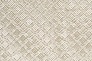High-resolution image of a cream-colored textured fabric. Perfect for backgrounds and design projects.