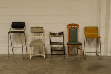 Obraz premium Variety of chairs, bar stools, and seating options. Perfect for interior design or home decor.