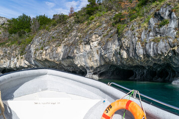 Boat approaching marble caves of patagonia, chile in general carrera lake