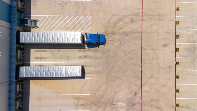 Overhead shot of truck and trailer on warehouse loading dock