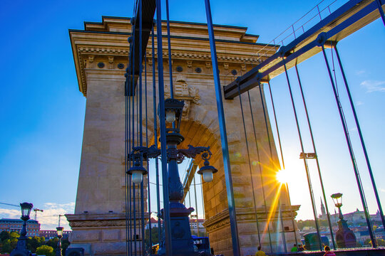 The Chain Bridge over the Danube River in Budapest, Hungary, at sunset.