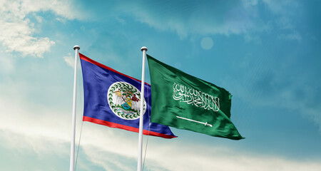 Belize and Saudi Arabia friendship flags are waving in the sky. Two country flag for agreement or deal. Belize KSA national flag for commitment.