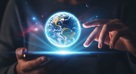 A person's hands interact with a glowing digital hologram of planet Earth above a device.