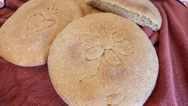 Decorative Moroccan flatbread (a mixture of natural yeast, whole wheat flour and white flour)