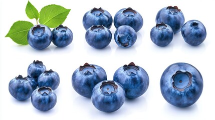 Set of blueberries isolated on a white background. Blueberries with leaves, closeup. Collection of fresh blueberries.