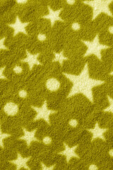 
Star fabric for children's clothing, top view. Textile material with ornament. Sewing industry.