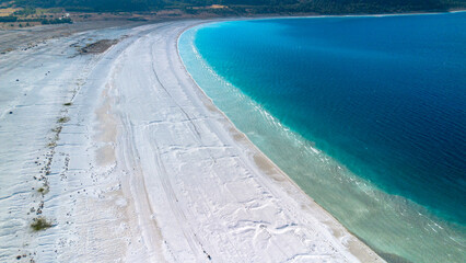 The tranquil beauty of Salda Lake - Turkey with its crystal clear turquoise waters and stunning...